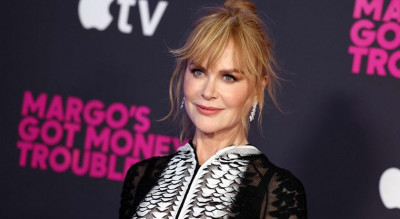 妮可基嫚穿「透視鱗片裝」側身零遮蔽！手戴絕版OMEGA 巨星地位不同凡響