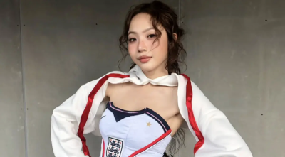 世界盃反指標女神爆紅！正妹剪球衣支持隊伍　每點必輸吸200萬粉